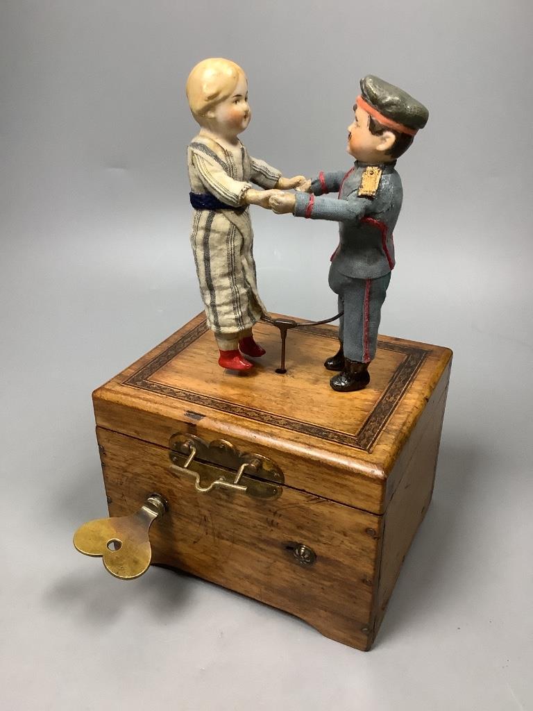 An early 20th century German musical dancing doll automaton, height 23cm